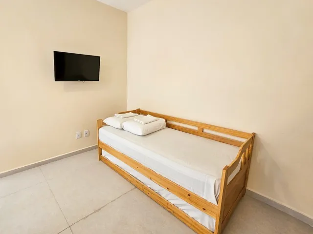 Sofá-cama do Quarto Deluxe Hidromassagem 5205 do Ilha Flat Hotel