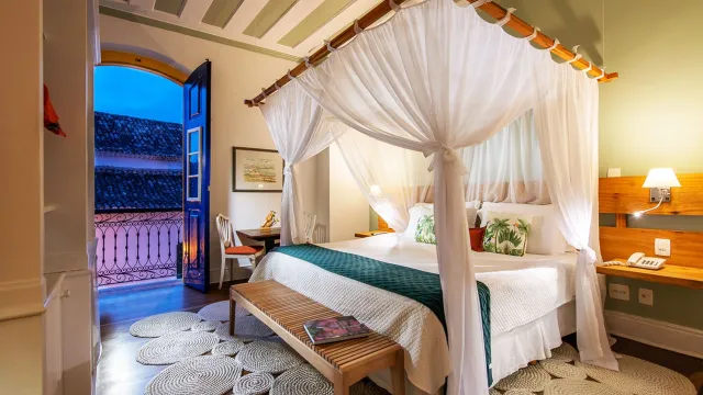 Suíte Sacada Quádrupla no Sandi Hotel