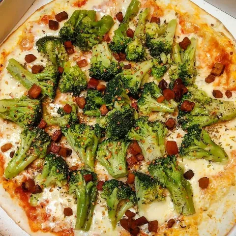 Pizzas servidas pela Pizzaria Família Bella