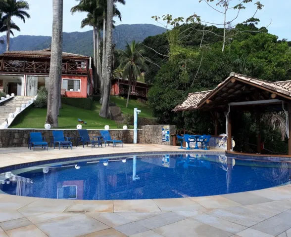 Área externa e piscina da Pousada Singuitta
